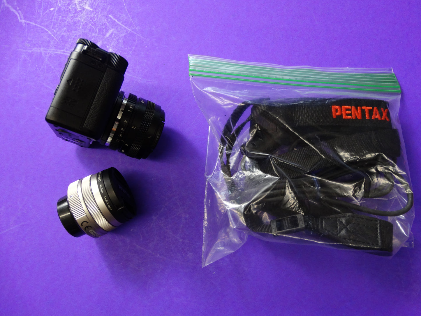 Pentax Q Mirrorless Digital Camera with 01 Standard Prime 8.5mm f/1.9 & 02 Standard Zoom 5–15mm Lenses