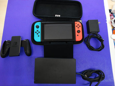 Nintendo Switch Console (Neon Red/Blue) with Dock, Joy-Con Grip, Charger, HDMI & Carrying Case – Complete Set - WeBuyElectronic