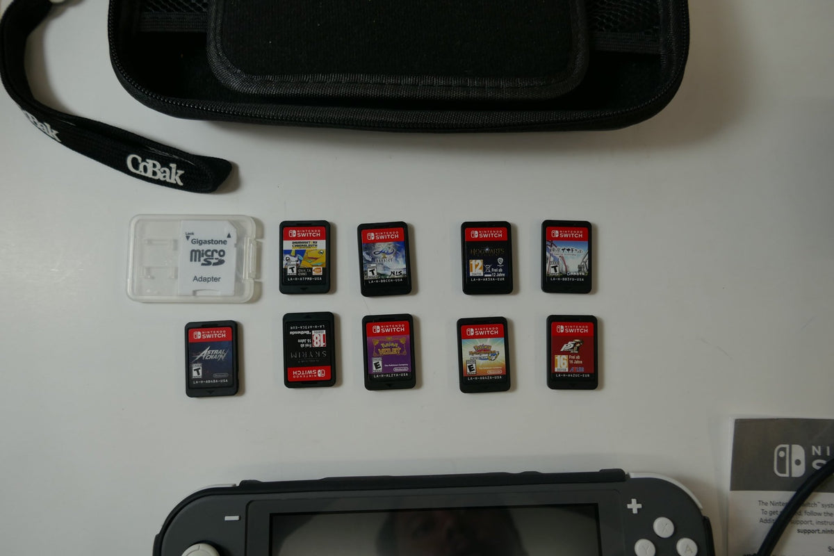 Nintendo Switch Lite Gray Bundle – 512GB SD Card + 9 Game Cartridges (Pokémon, Skyrim, Persona 5, Hogwarts & More) - WeBuyElectronic