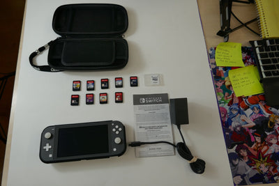 Nintendo Switch Lite Gray Bundle – 512GB SD Card + 9 Game Cartridges (Pokémon, Skyrim, Persona 5, Hogwarts & More) - WeBuyElectronic