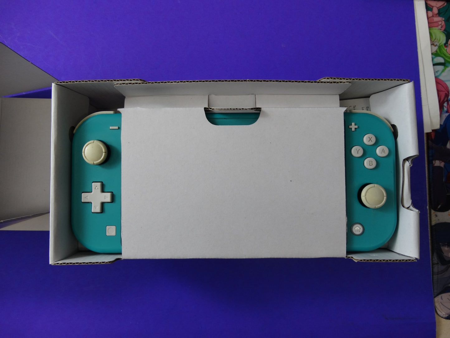 Nintendo Switch Lite – Turquoise Handheld Console – Portable Gaming System - WeBuyElectronic