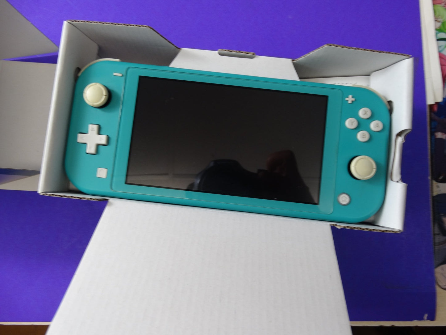 Nintendo Switch Lite – Turquoise Handheld Console – Portable Gaming System - WeBuyElectronic