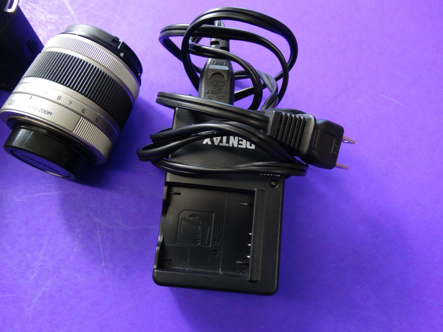 Pentax Q7 Mirrorless Camera Kit – Body + 2 Lenses (Pentax 02 Standard Zoom) + Charger & Strap - WeBuyElectronic